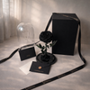 preserved black rose in glass dome