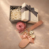 Keychain with heart-shaped charms and pink preserved  rose next to a gift box, ready to gift, Australia