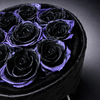 Round black leather bouquet filled with black and purple preserved roses 