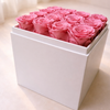 White box filled with pink preserved  roses gift for Mother’s Day, luxury box
